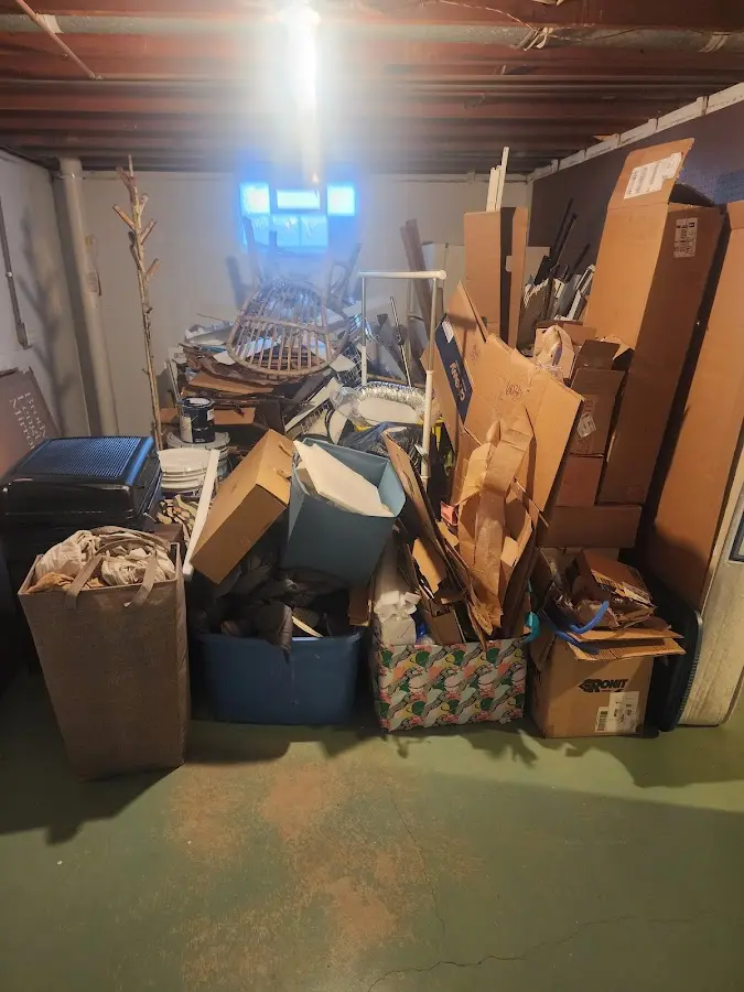 Roll-off dumpster container at job site for 2 Yard Dumpster Rental in Medical Lake